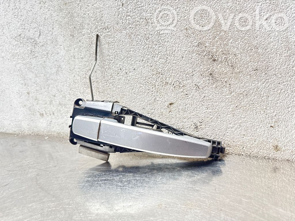Opel Astra J Front door exterior handle 