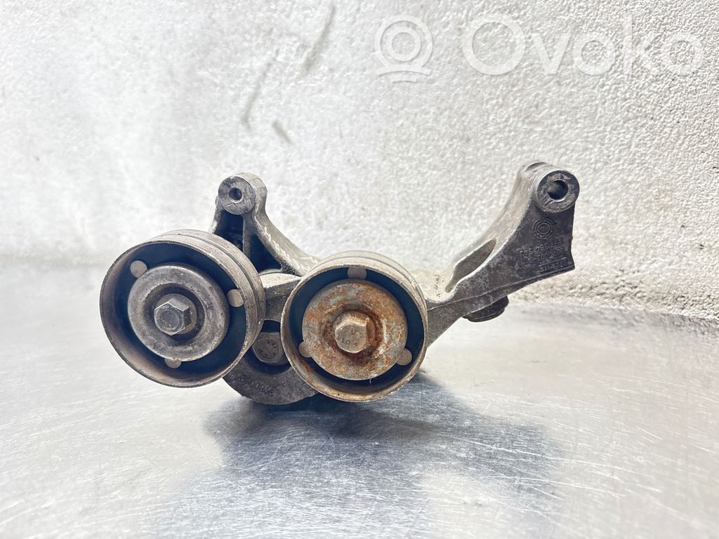 Opel Astra H Generator/alternator belt tensioner 