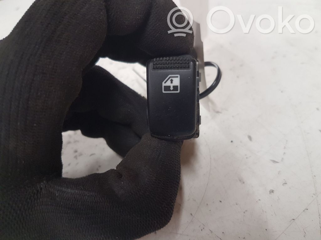 KIA Carens I Elektrisko logu slēdzis 