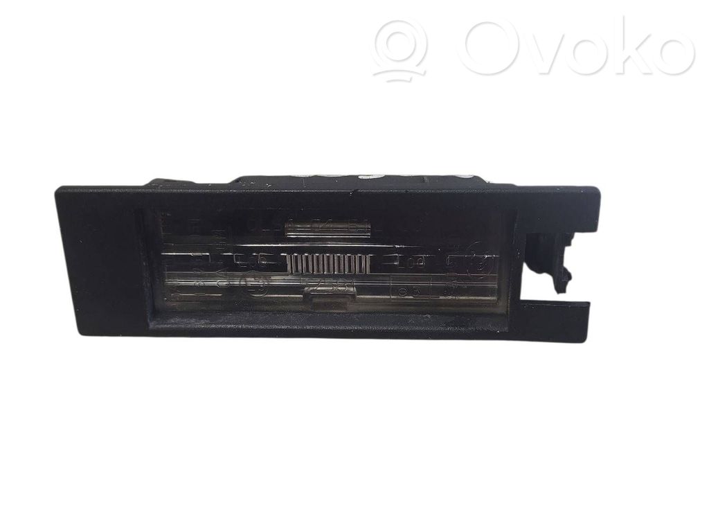 Opel Astra J Éclairage de plaque d'immatriculation 