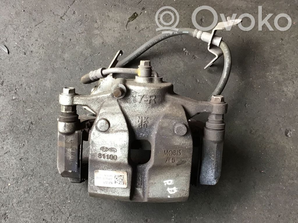 Hyundai Tucson IV NX4 Caliper de freno delantero 