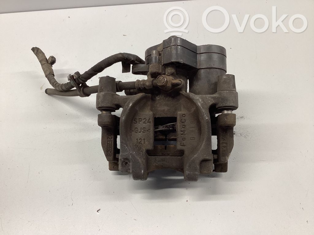 Ford Mondeo MK V Tylny zacisk hamulcowy 