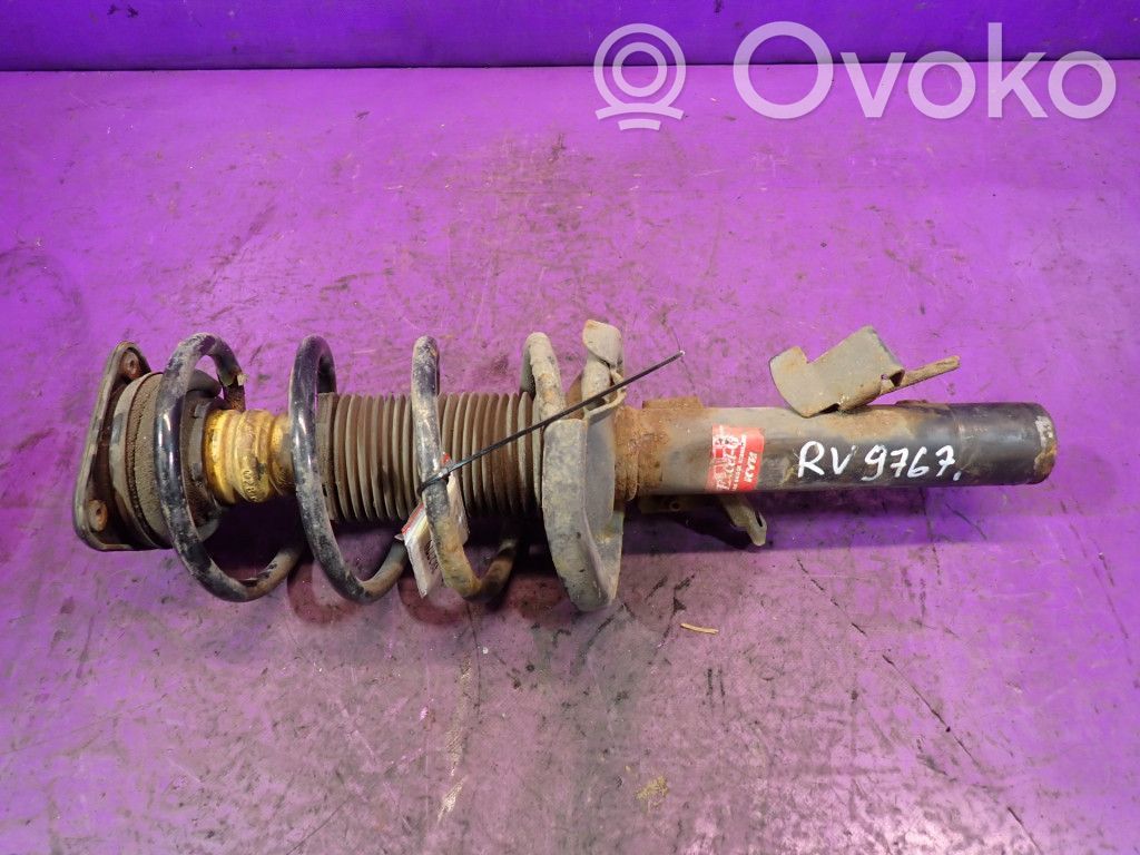 Front shock absorber with coil spring