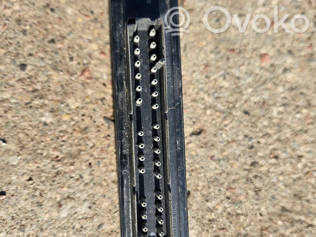 BMW 5 E34 Komforto modulis 