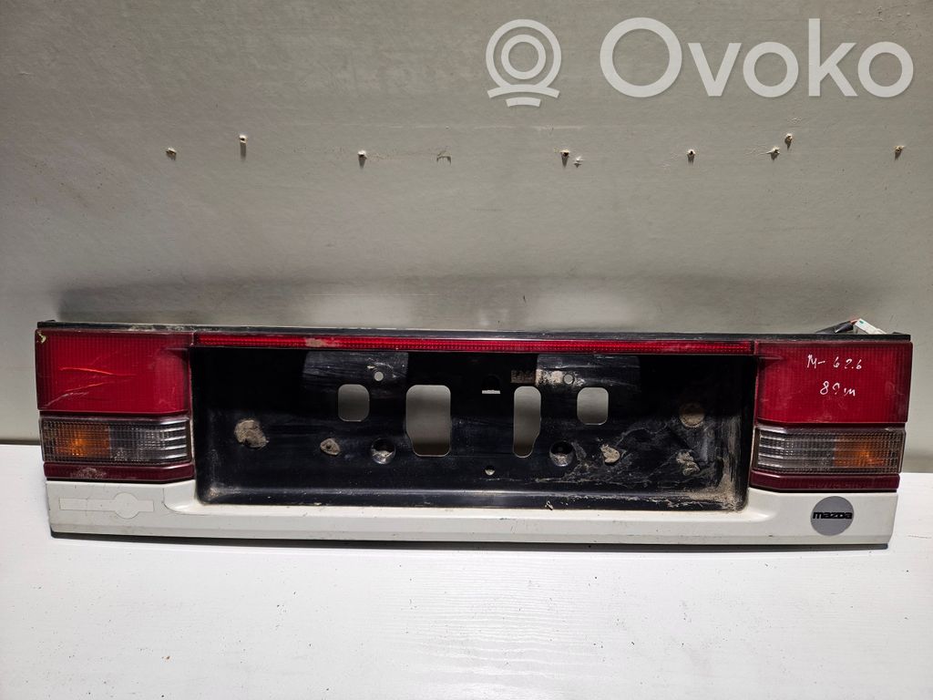 Mazda 626 Rear light center trim bar blend 