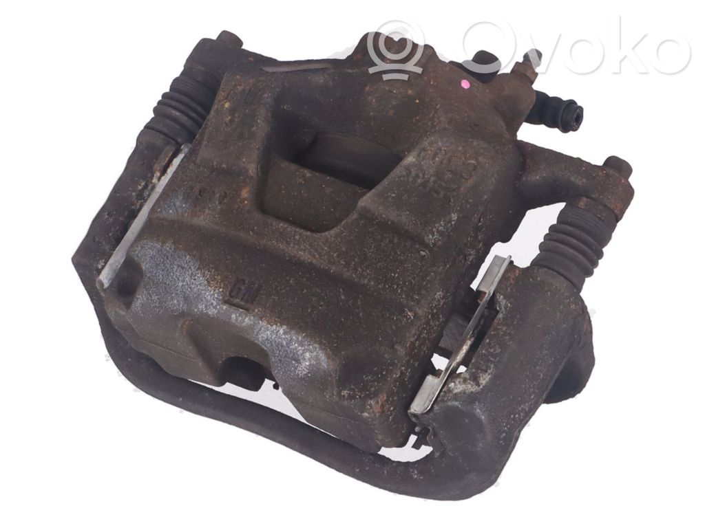 Opel Astra J Front brake caliper 