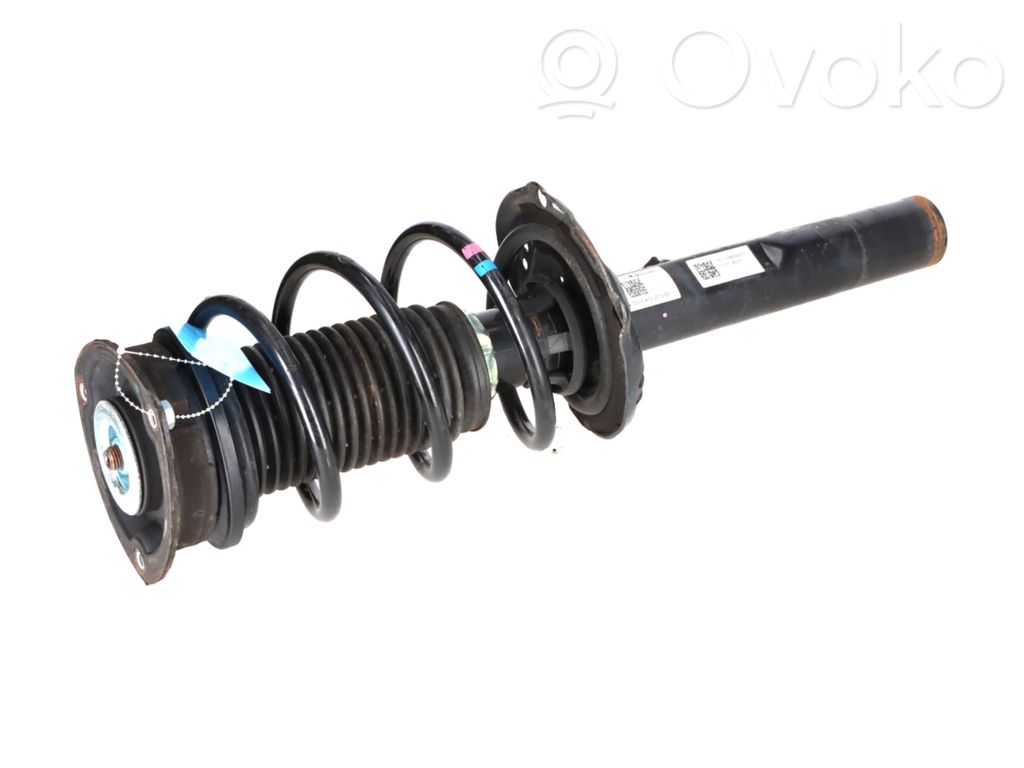 Volkswagen Golf VII Amortiguador delantero con muelle espiral