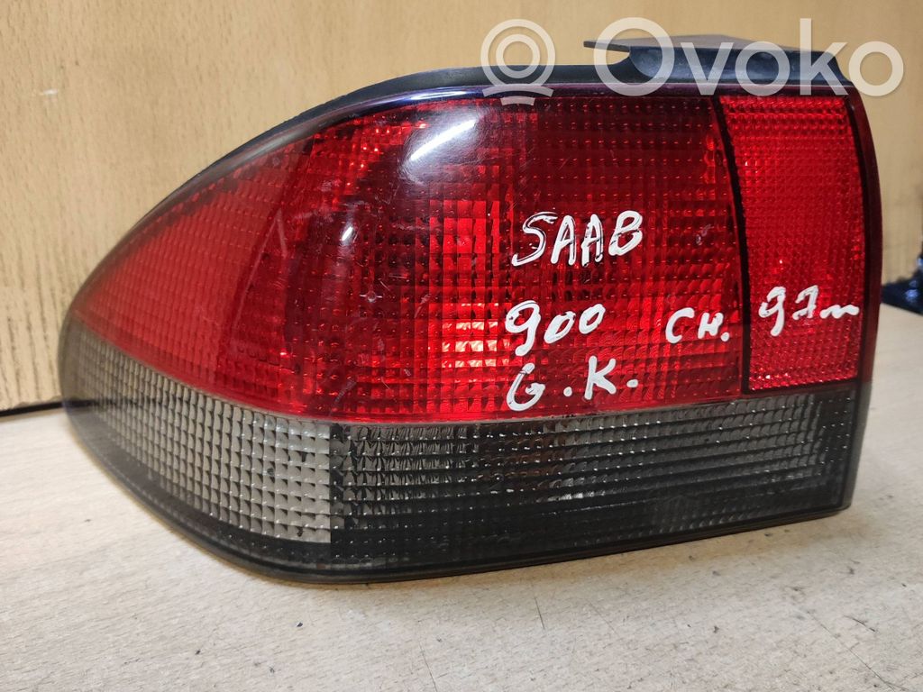 Saab 900 Takavalon polttimon suojan pidike 