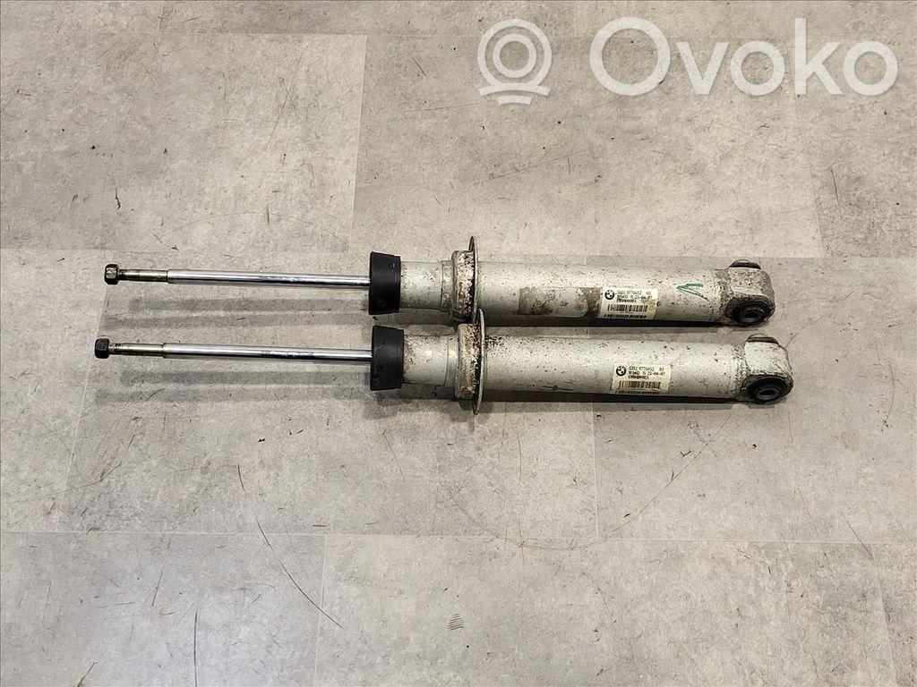 BMW 5 E60 E61 Aizmugurē amortizators ar atsperi 