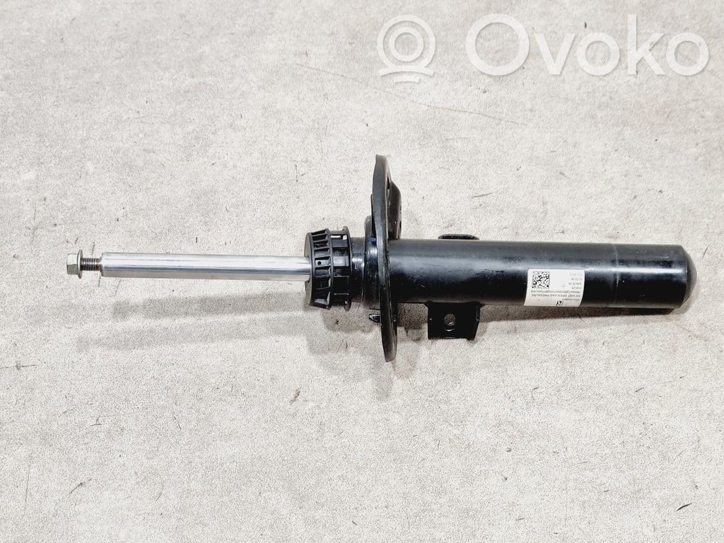Amortyzator osi przedniej ze sprężyną   31315A04C38,31315A04C38