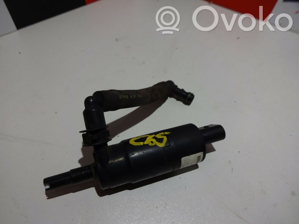 Headlight washer pump   8377430
