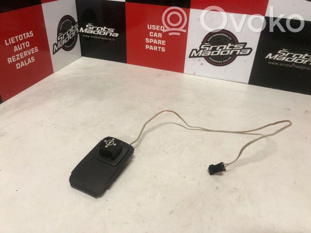 Steering wheel adjustment switch   6911536