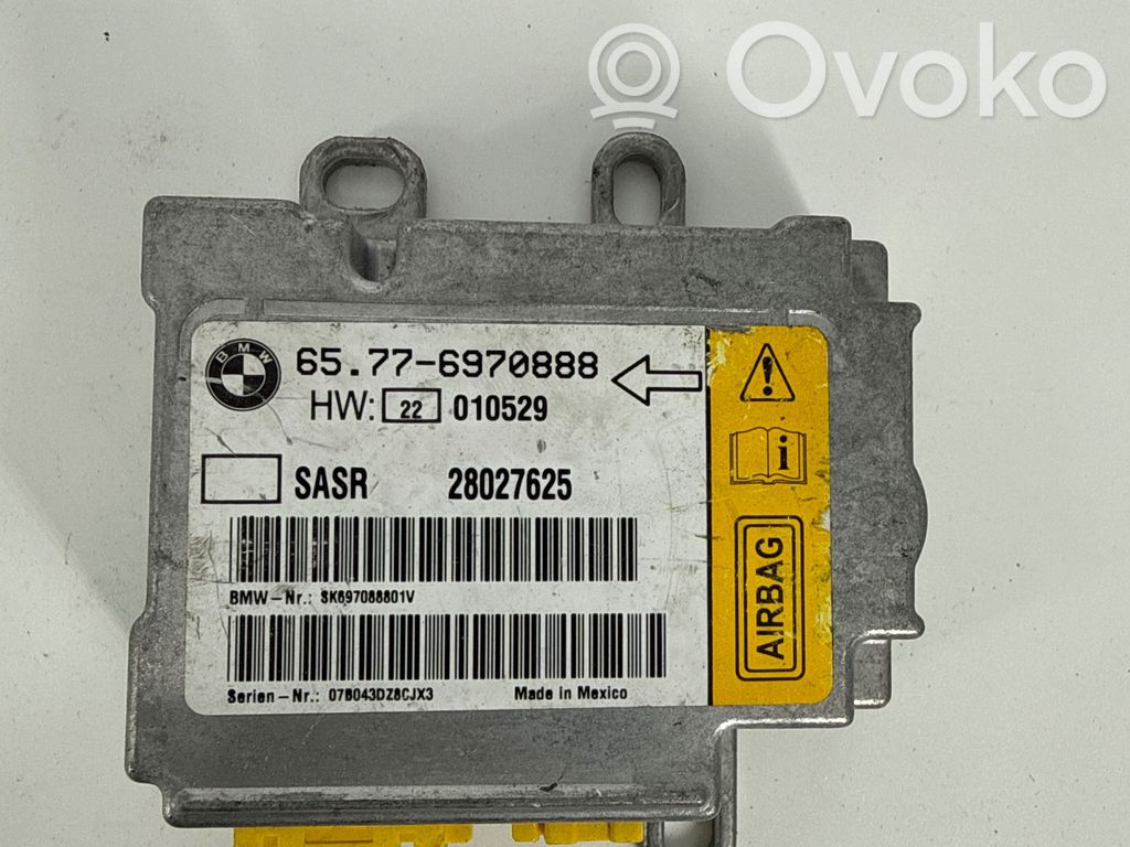 Module de contrôle airbag   6970888,28027625,E1010529