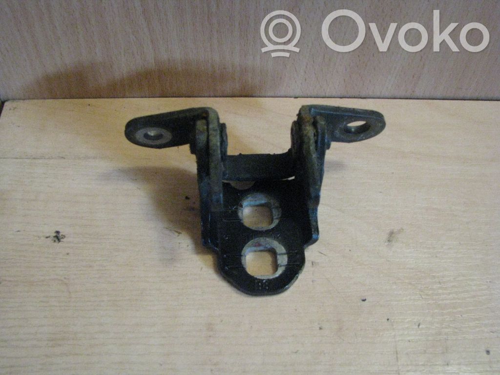 Rear door upper hinge