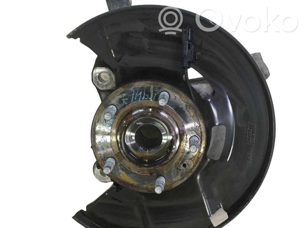 Opel Astra J Zwrotnica koła przedniego 