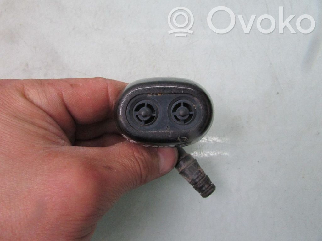 Opel Omega B2 Wąż / Przewód spryskiwacza lampy przedniej 