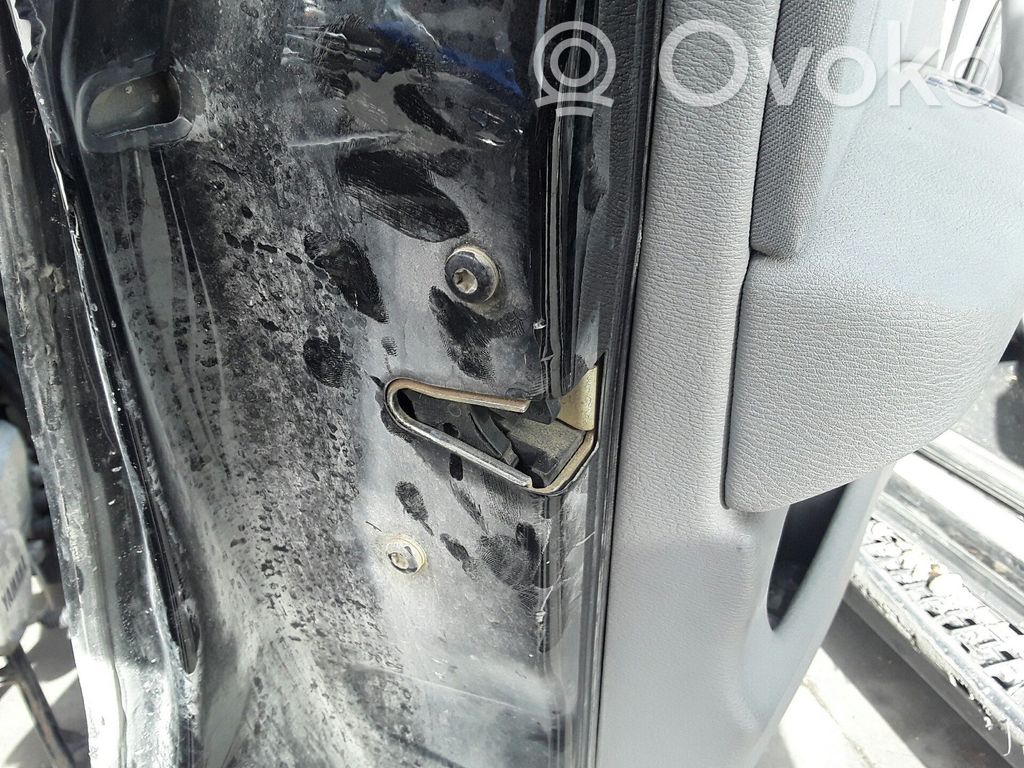 BMW X3 E83 Cerradura de puerta delantera (junto a la manecilla) 
