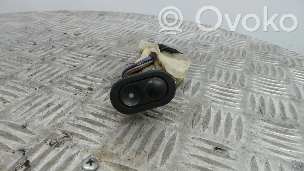 Opel Corsa B Front door window switch trim 