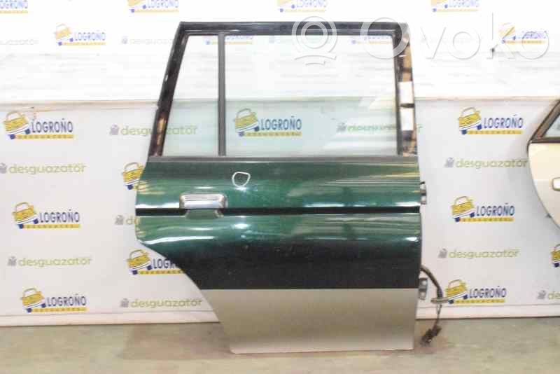 Mitsubishi Montero Regulador manual de la ventanilla trasera 