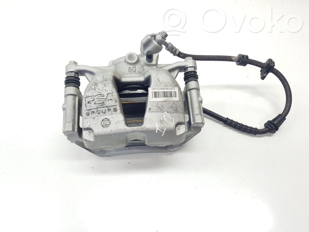 Opel Astra L Zacisk hamulcowy przedni 