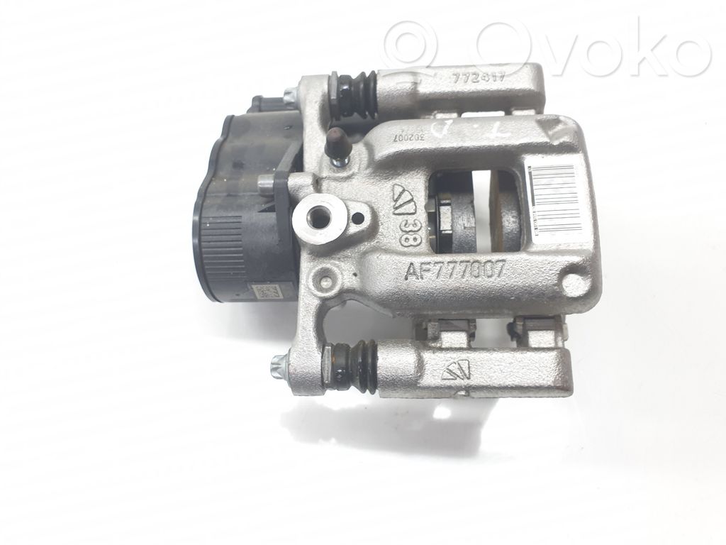 Opel Astra L Tylny zacisk hamulcowy 