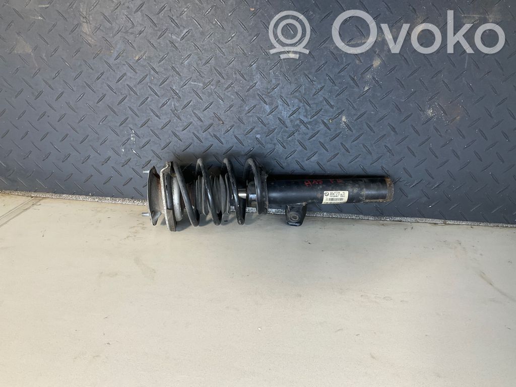 Front shock absorber with coil spring   6772219,E60V009BX