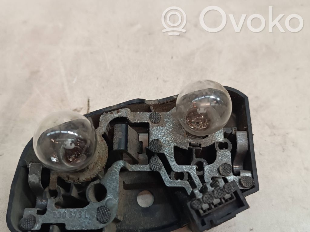 Tail light bulb cover holder   388569