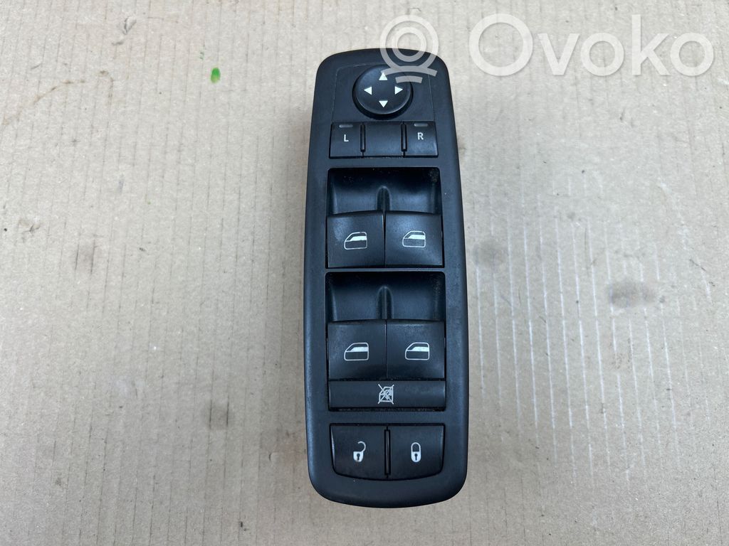 Electric window control switch   68039999AA
