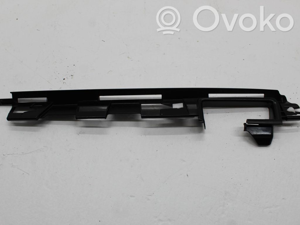 Volkswagen PASSAT B7 Uchwyt / Mocowanie zderzaka tylnego 