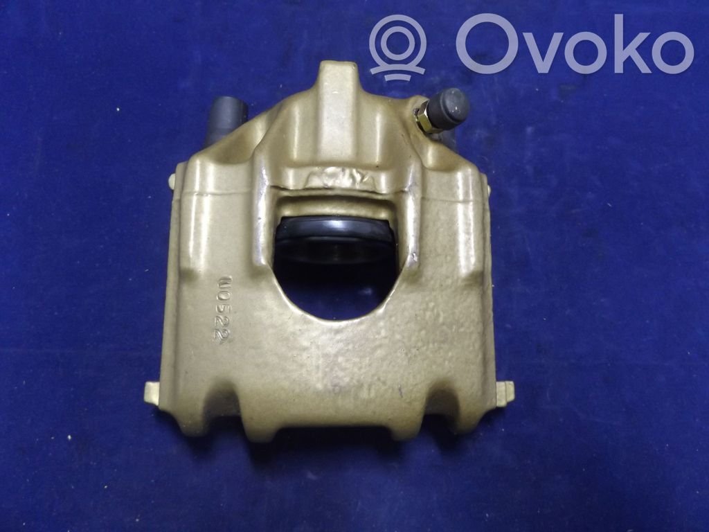 Volkswagen Polo II 86C 2F Zacisk hamulcowy przedni 