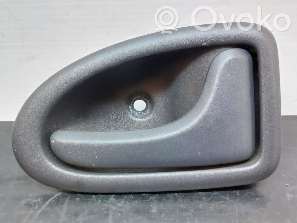 Etuoven ulkokahvan kehys   7700415975