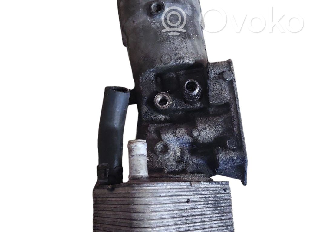 Mocowanie / uchwyt filtra oleju   045115389C,045118466,070115562,1118184,45115389A,45115466A,45115466B,71115562C,MN980125