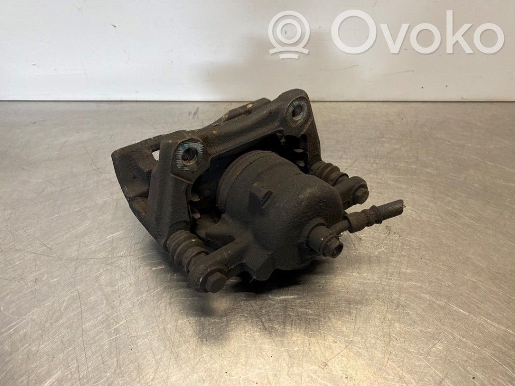 Nissan Note (E12) Front brake caliper 
