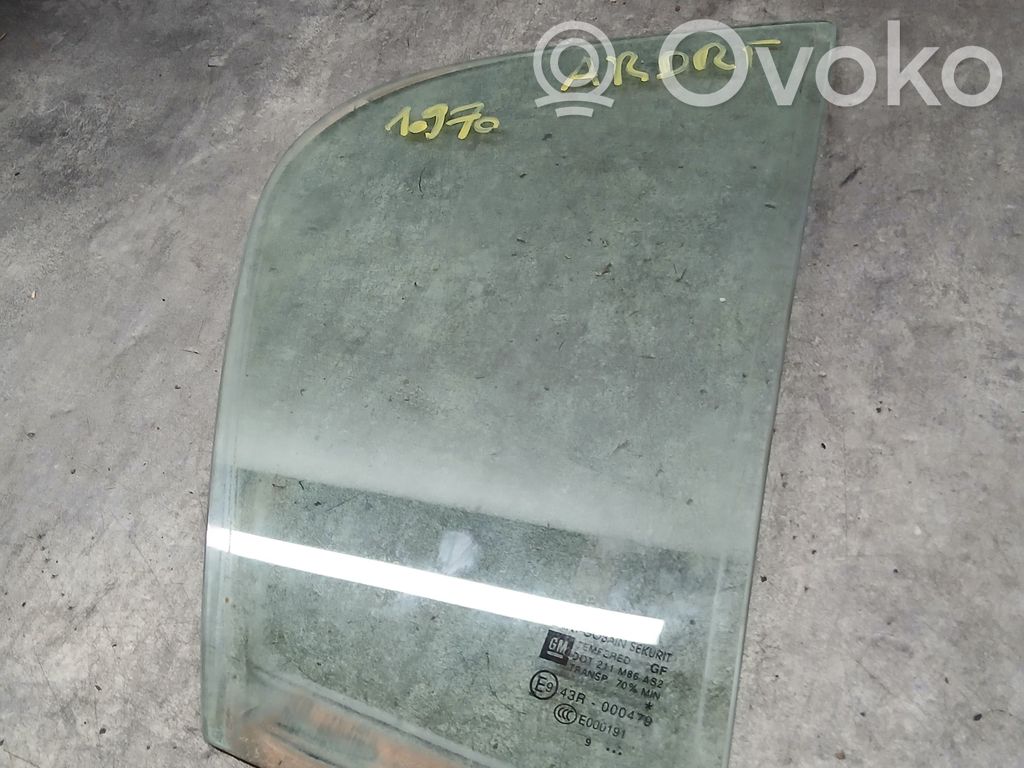 Opel Corsa D Ventanilla de ventilación de la puerta trasera 