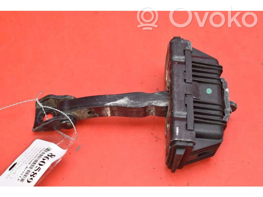 Front door check strap stopper