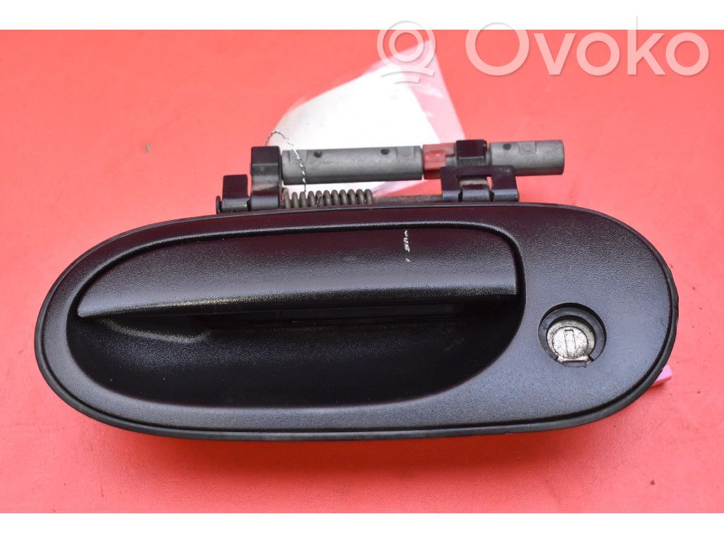 Nissan Almera Tino Manecilla externa puerta delantera