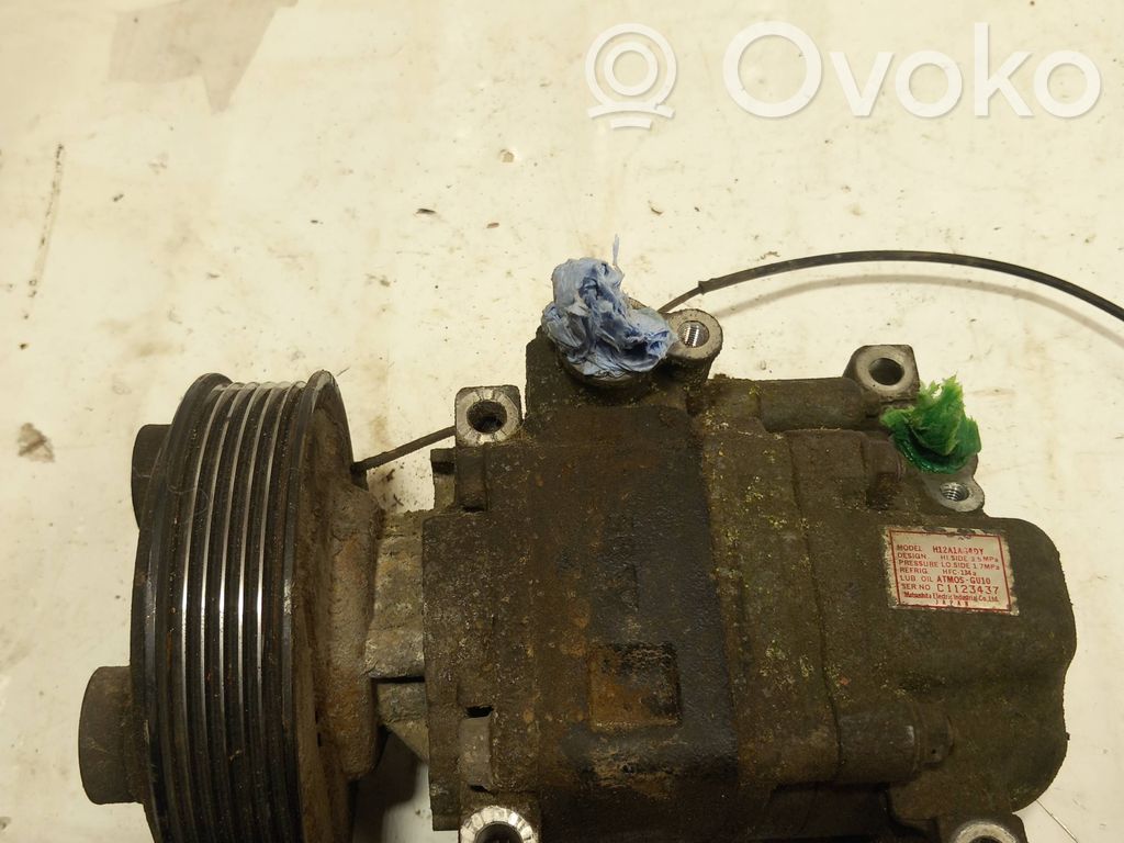 Mazda 3 I Air conditioning (A/C) compressor (pump) 