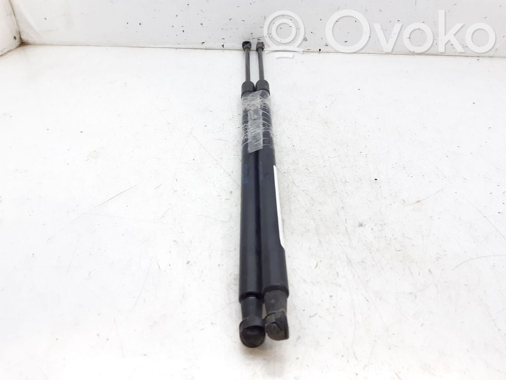 Nissan Note (E11) Amortiguador/puntal del maletero/compartimento de carga 