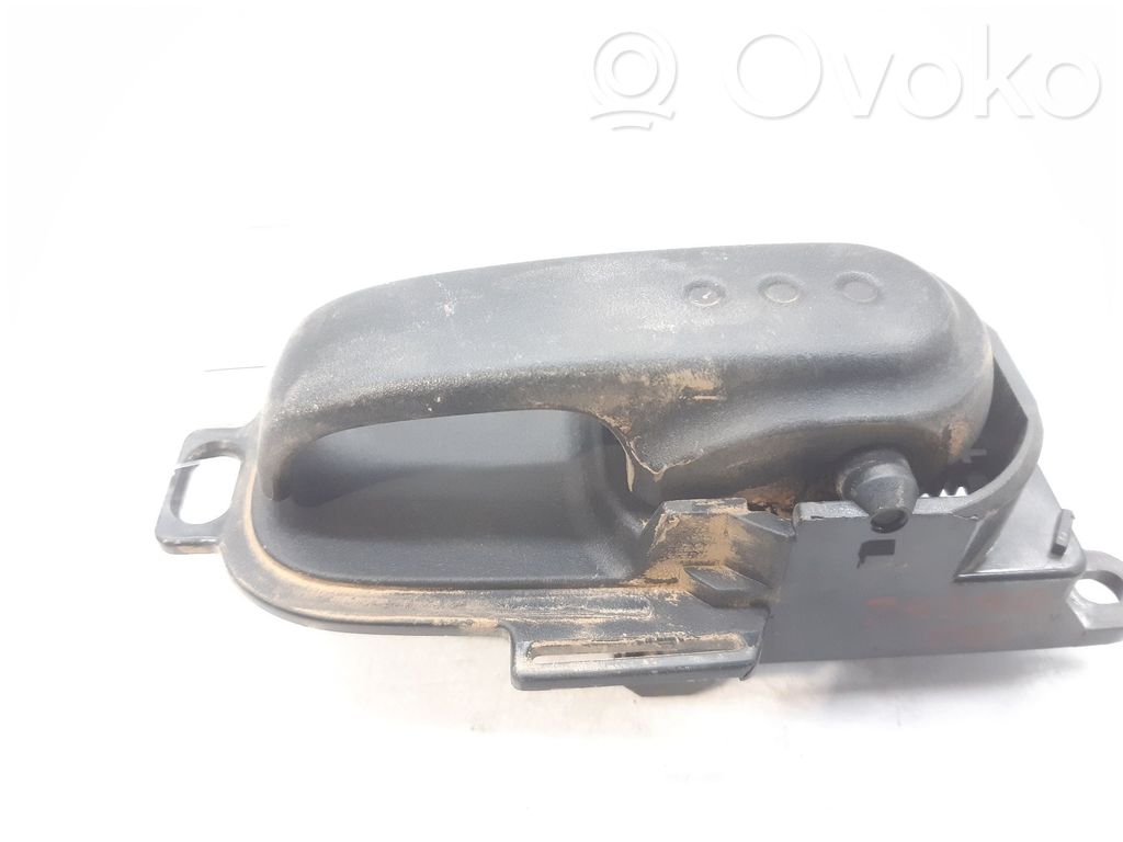 Manecilla interna puerta delantera   806709U000
