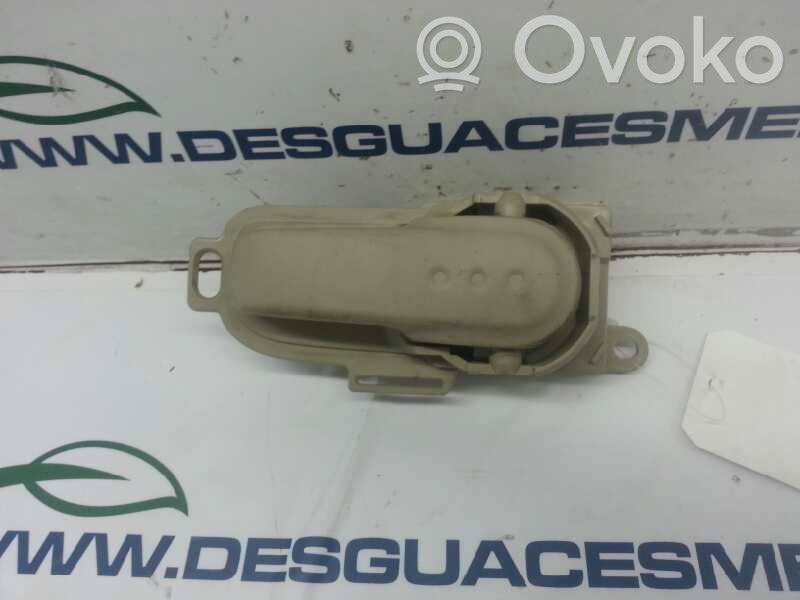 Nissan Micra Manecilla interna puerta delantera 