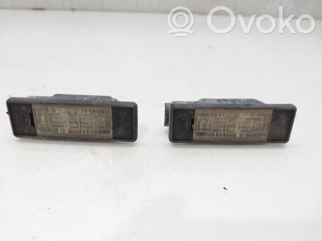 Nissan Pathfinder R51 Lampa oświetlenia tylnej tablicy rejestracyjnej 