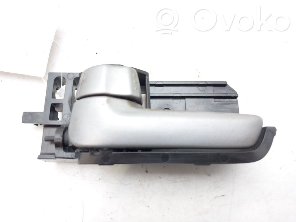 Suzuki Swift I Manecilla interna puerta delantera 