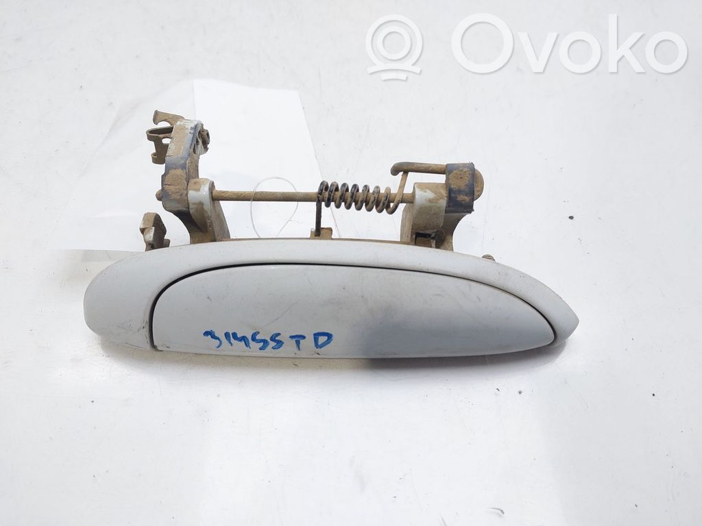 Manecilla externa puerta trasera   7700433076
