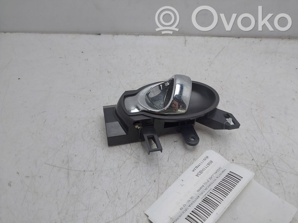Nissan Juke I F15 Manecilla interna puerta delantera 