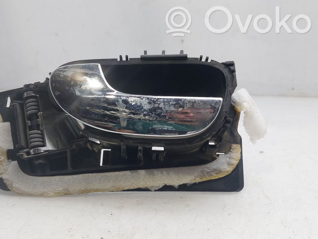 Manecilla interna puerta trasera   9143F4