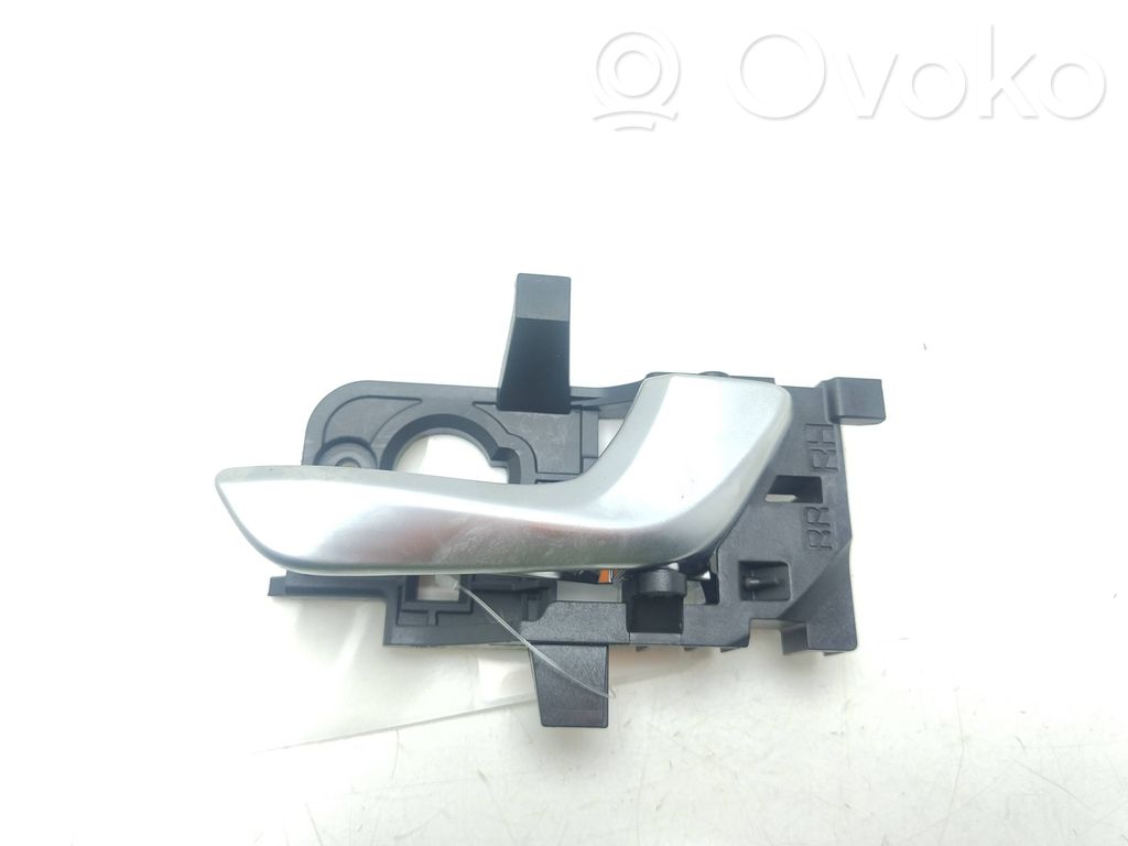 KIA Stonic Manecilla interna puerta trasera 