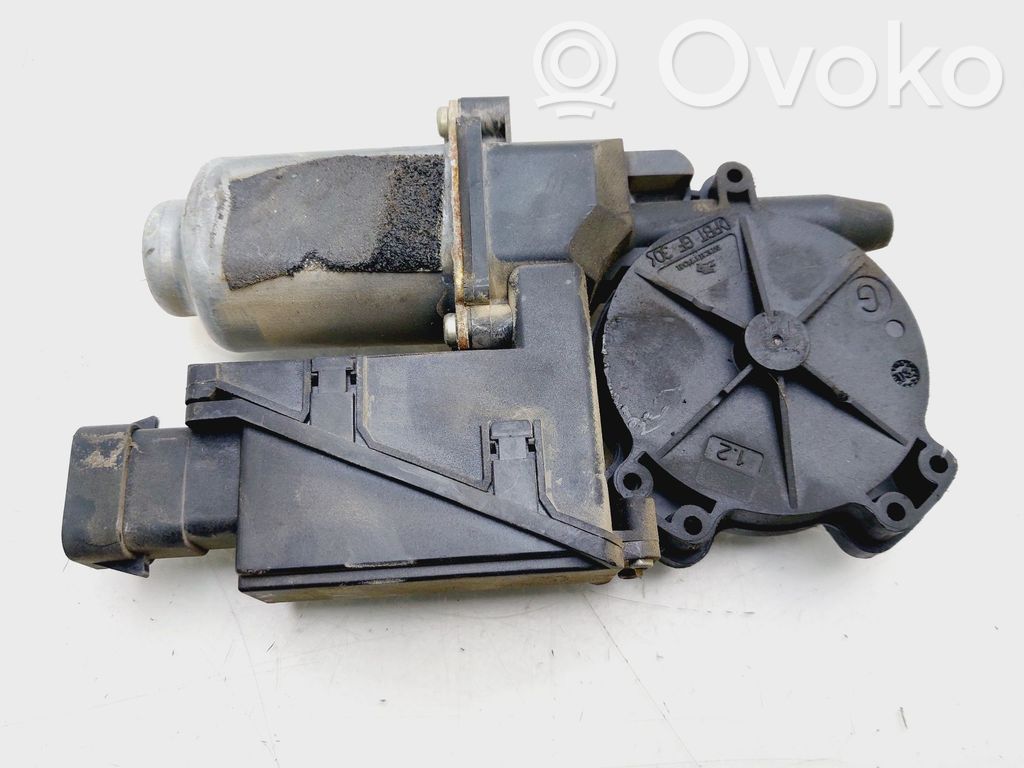 Opel Corsa C Motor del regulador de la ventanilla de la puerta delantera 