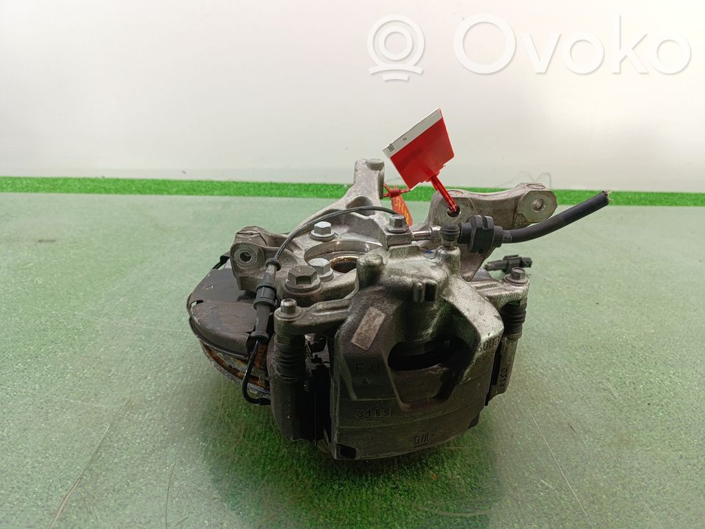 Opel Astra J Zwrotnica koła przedniego 