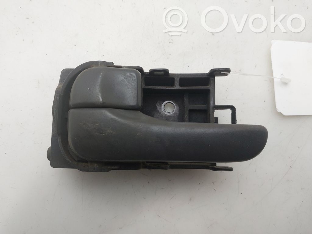 Nissan Almera N16 Iekšējais atvēršanas rokturītis