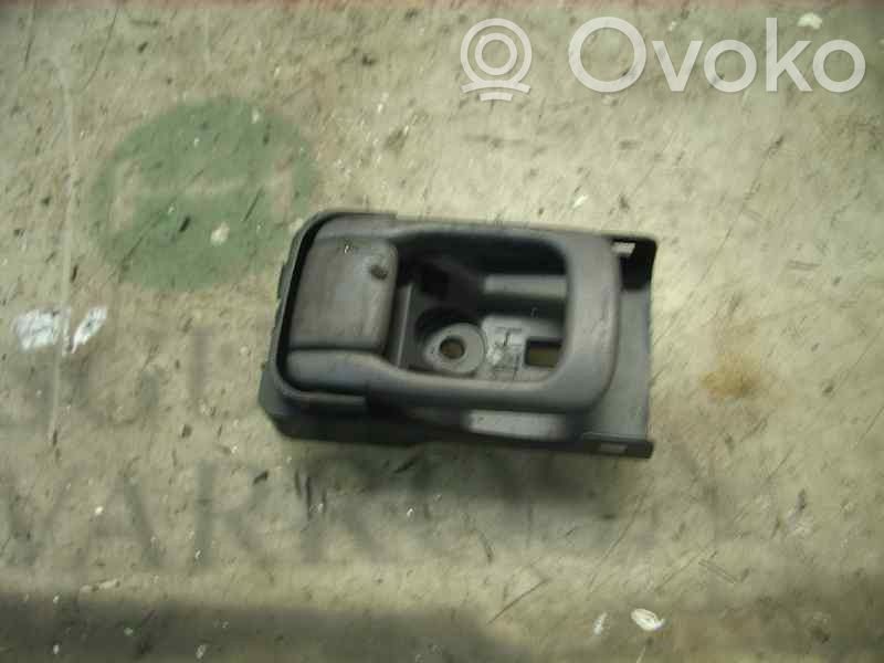 Manecilla interna puerta delantera